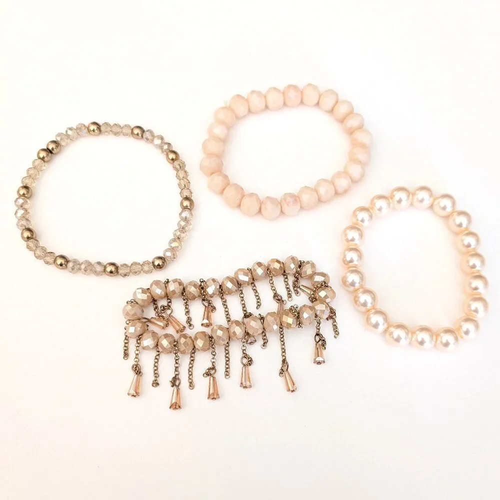 Bundle of nude and natural beaded stretch bracelets